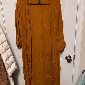 Rust kimono with embroidered flowers